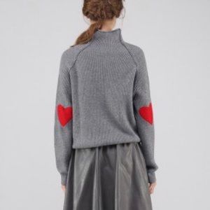 Gray sweater with heart patches on elbows